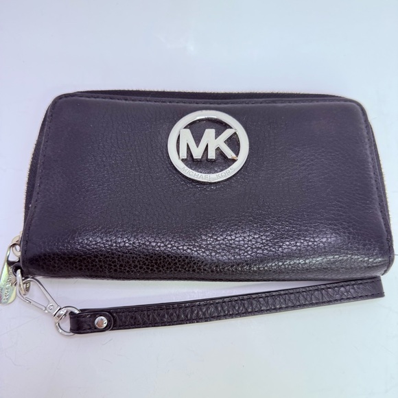 Michael Kors Handbags - Michael Kors zip around black pebbled leather wristlet or phone case.